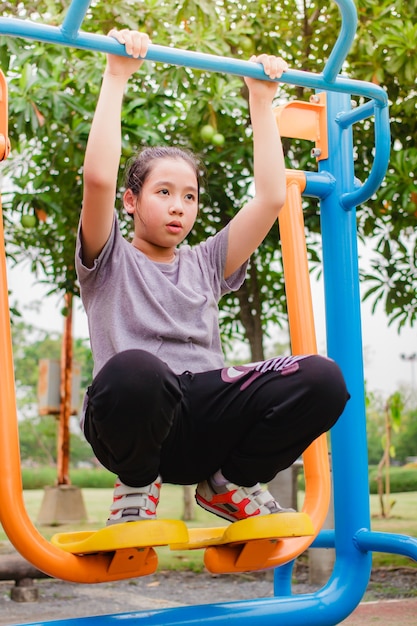 Girl exercise in the park.