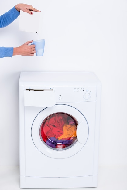 Girl falls asleep in glass of powder for a washing machine.