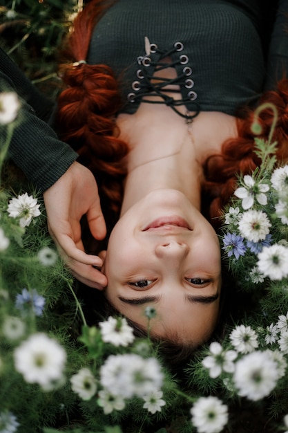 girl on a field of white flowers