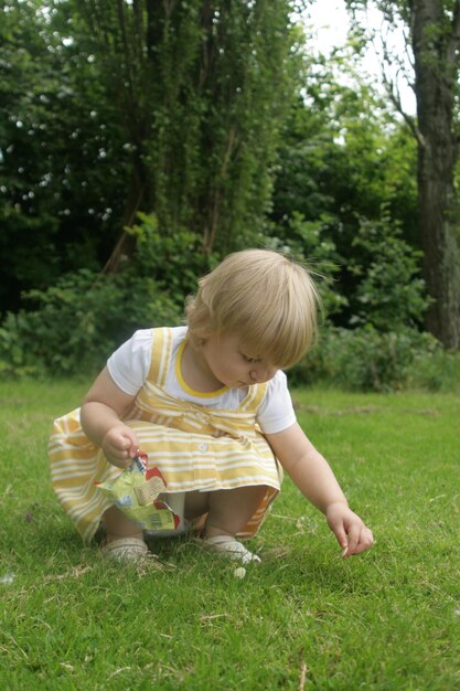 Girl  on field yellow dress