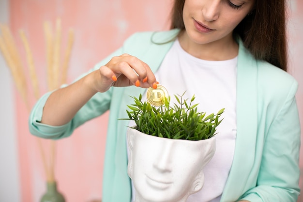 Girl finding dogecoin in head with grass