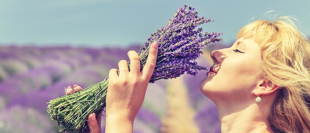 Girl in a flowering field of lavender. 