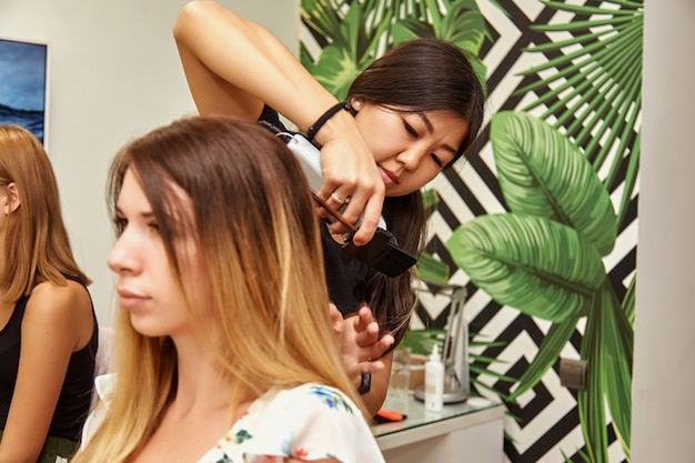 Girl getting her hair cut at the salon