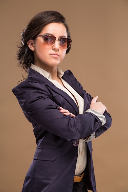 Girl in glasses and a blue dress