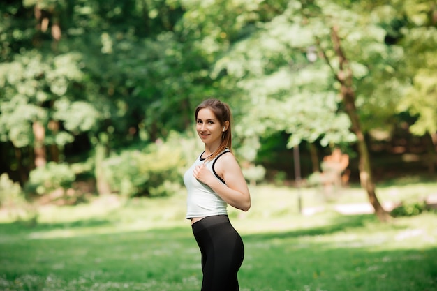 Girl goes in for sports in the park