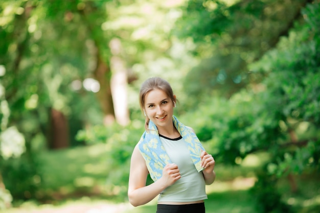 Girl goes in for sports in the park