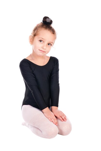 Girl gymnast isolated on a white background