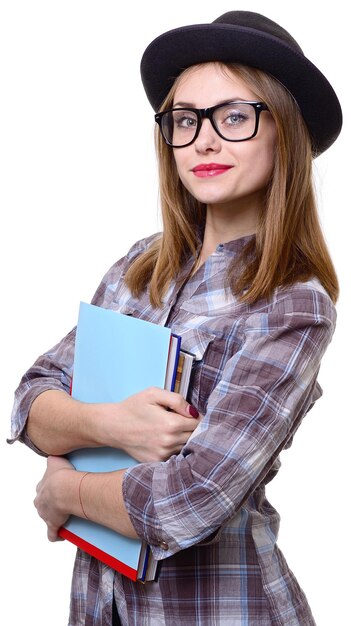 Photo girl in hat with books