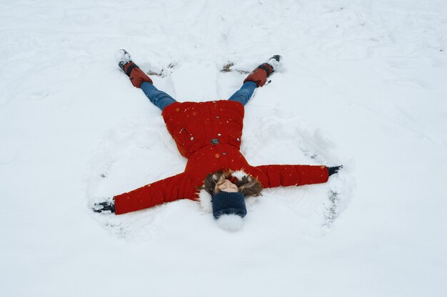 Girl having fun in snow