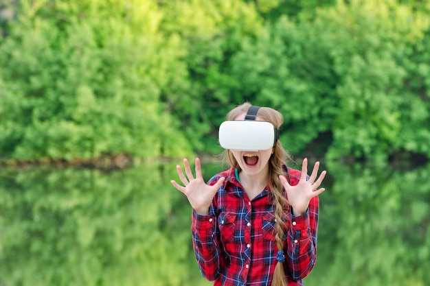 Girl in a helmet of virtual reality