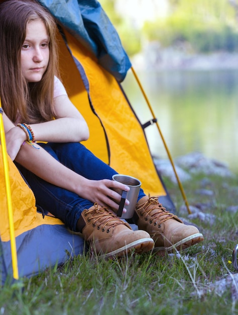 Girl hiker at the mountains