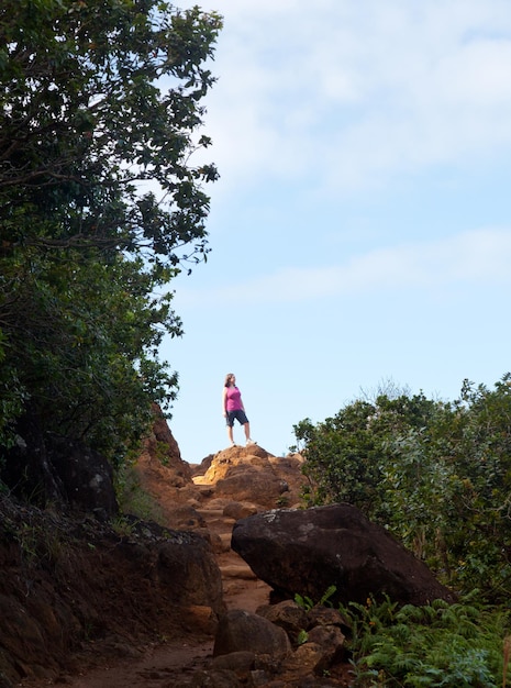 Girl hiking Kalalau trail in Kauai