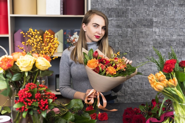 Girl holding a bouquet of flowers