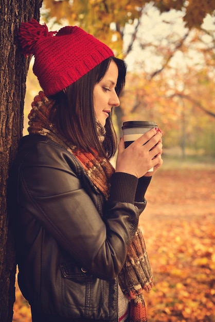 Girl holding coffee