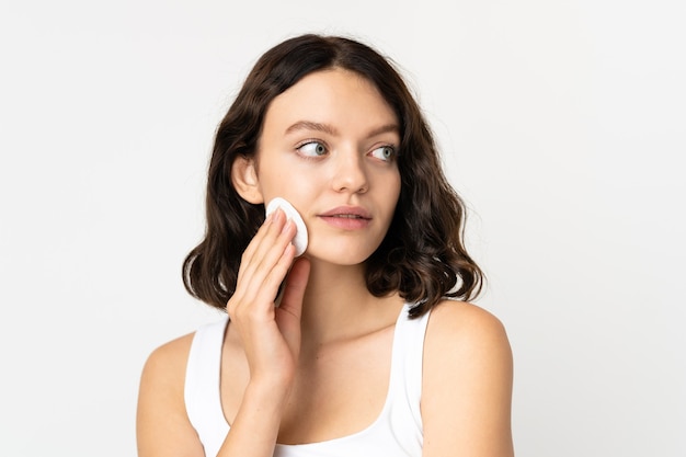 girl holding cosmetics pad