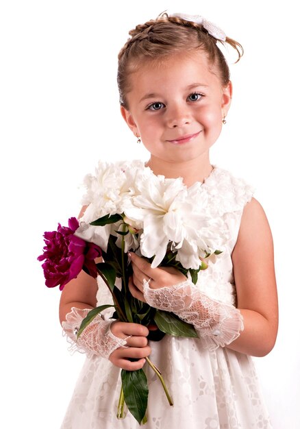 Girl holding fresh peonies bouquet on white background