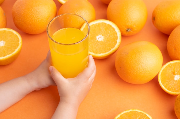 Girl holding glass of juice