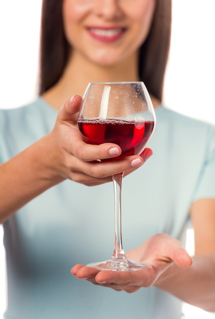 Girl holding a glass of wine