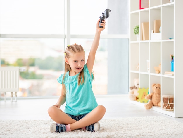 Girl holding joystick