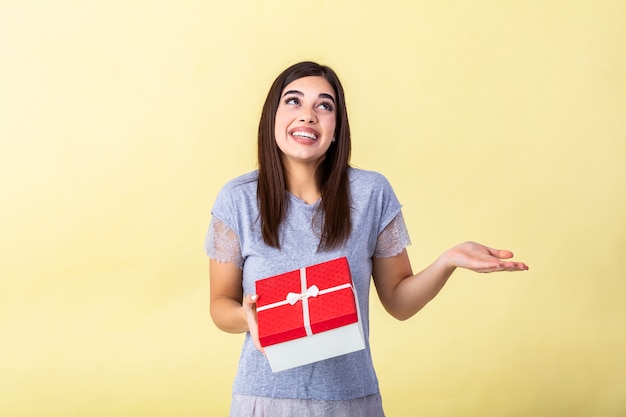 Girl holding large giftbox in hands