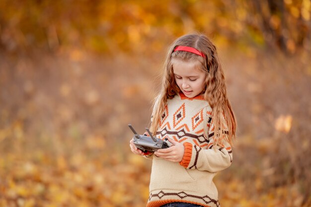 Girl holding remote controller