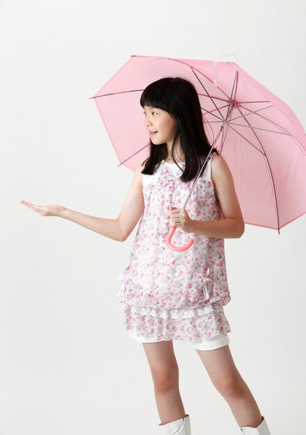 Girl holding umbrella