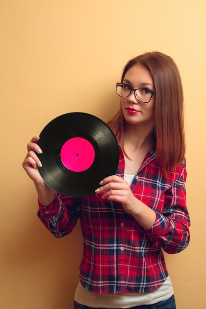 Girl holding a vinyl record