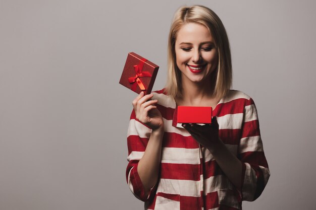 Girl holds gift box