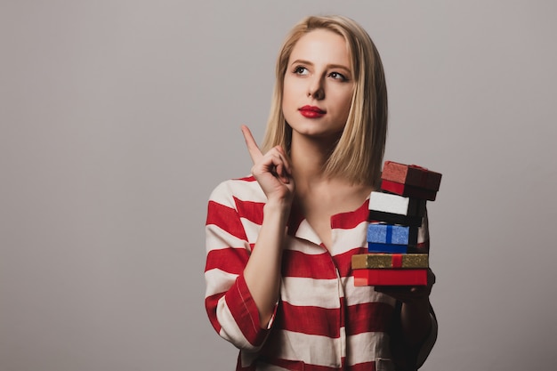 Girl holds gift boxes