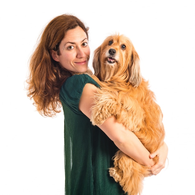 Girl hugging her dog