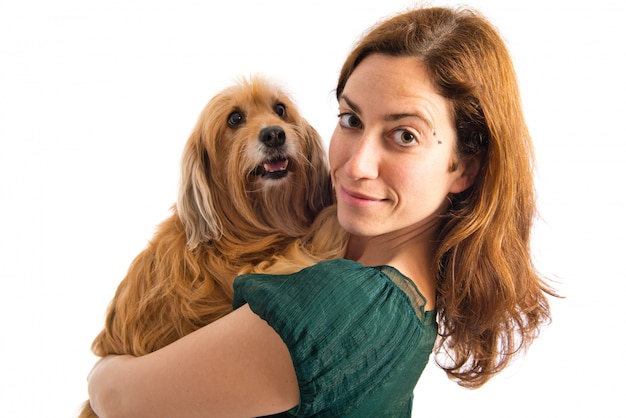 Girl hugging her dog