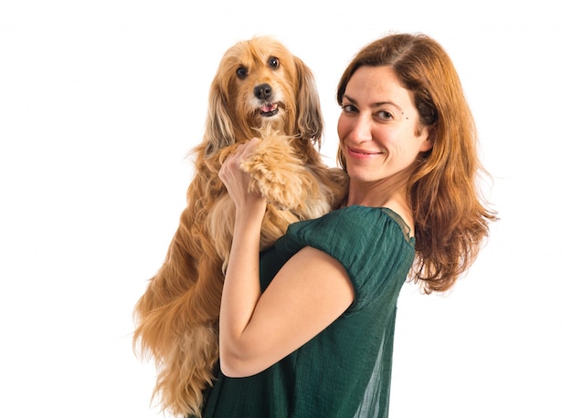 Girl hugging her dog