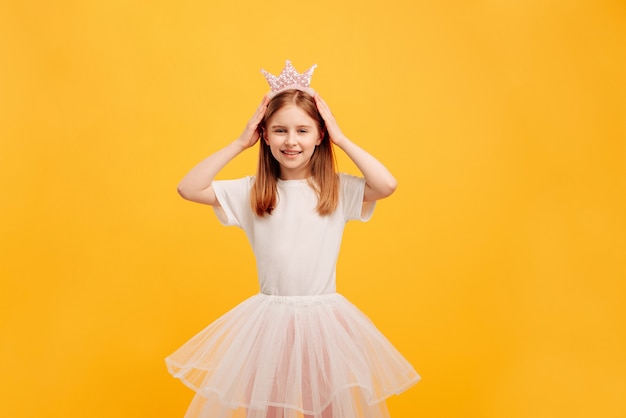 Girl isolated on yellow background