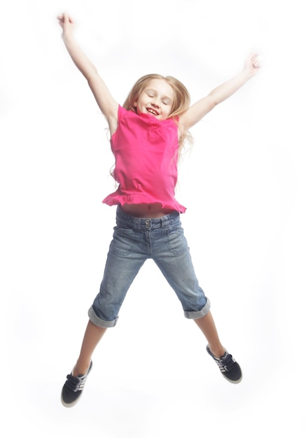 Girl jumps on a white background