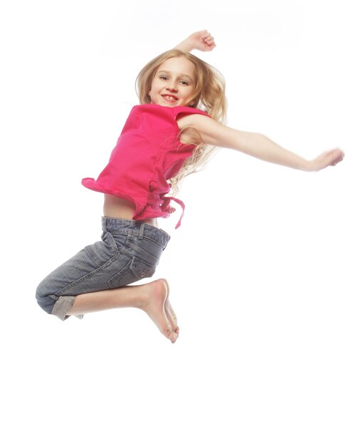 Girl jumps on a white background