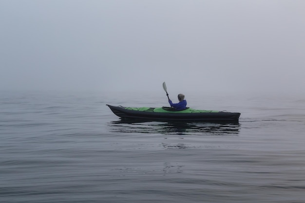 Girl kayaking on an inflatable kayak in Howe Sound