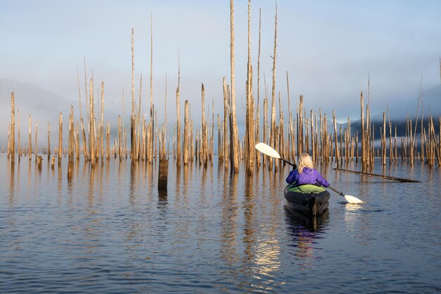 Girl Kayaking in a Lake