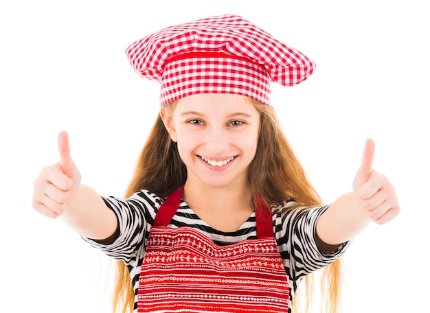 Girl in kitchen uniform shows thumbs up