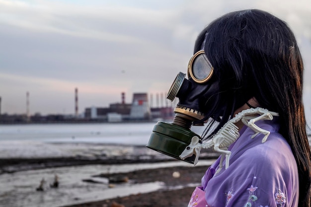 A girl in a Korean national dress and gas mask during covid19 coronavirus virus Ecological problem