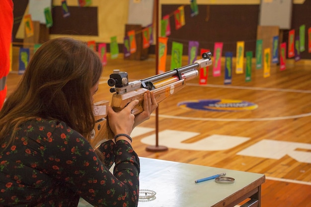 Girl Learning to shoot