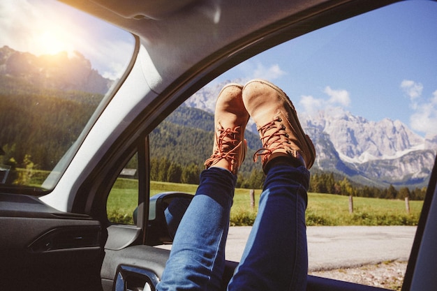 Girl legs sticking out of the car