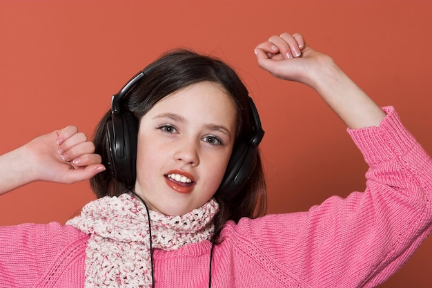 Girl listening music in headphones