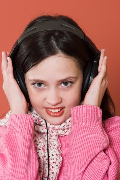 Photo girl listening music in headphones