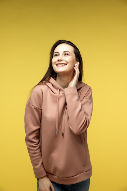 girl listening to music in wireless earphones