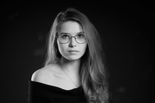 girl loft interior studio glasses / businesswoman in glasses, confidence, youth, nature.