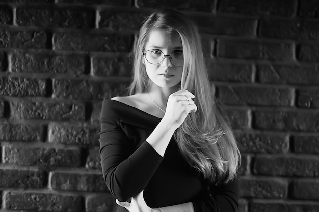 girl loft interior studio glasses / businesswoman in glasses, confidence, youth, nature.