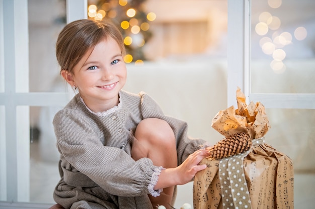 Girl looking at gifts full shot