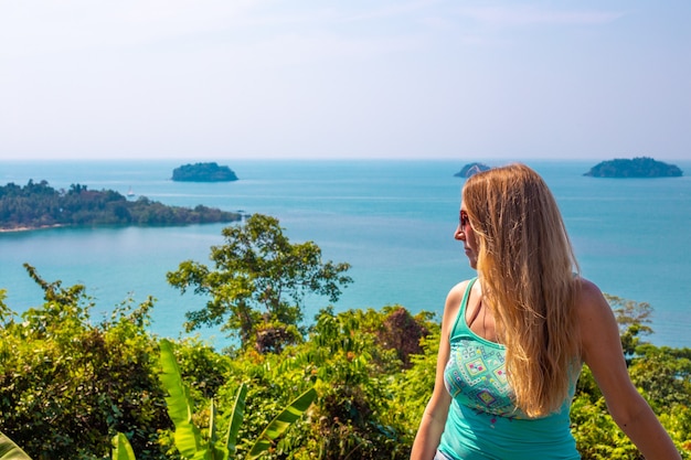 Girl looks at the sea on the observation deck of the island of Chang