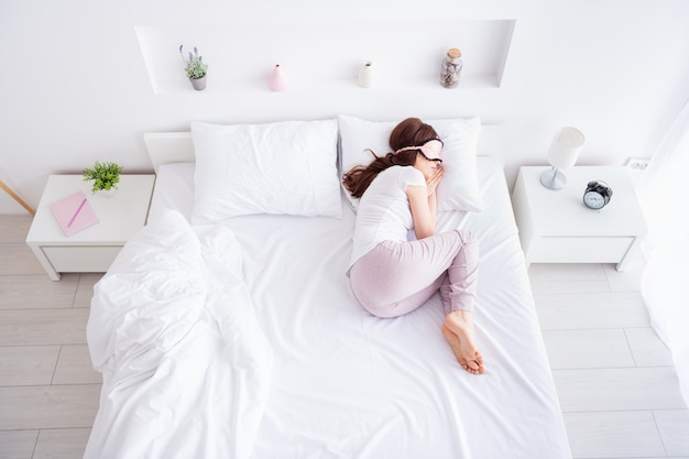 girl lying in bed sleeping sweet day time