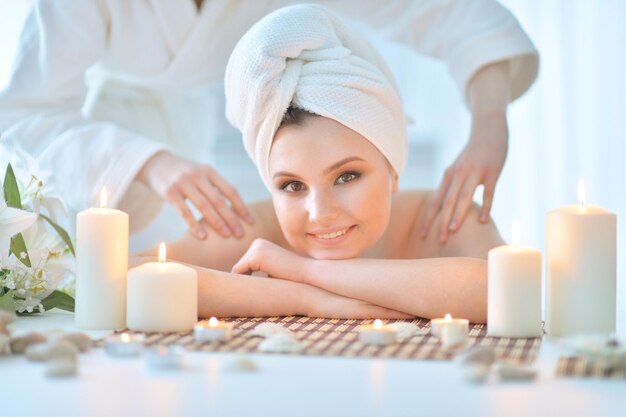 Girl lying down on a massage bed